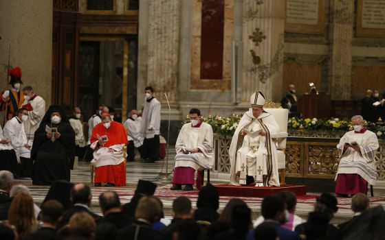 Pope Francis presides over an evening prayer service at the Basilica of St. Paul Outside the Walls in Rome Jan. 25, 2022. (CNS photo/Paul Haring)