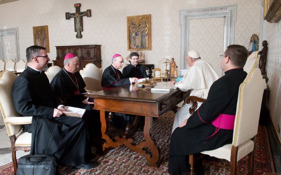 Pope Francis is pictured with officers of the Canadian bishops' conference during a meeting Dec. 9, 2021, at the Vatican. (CNS/Vatican Media)
