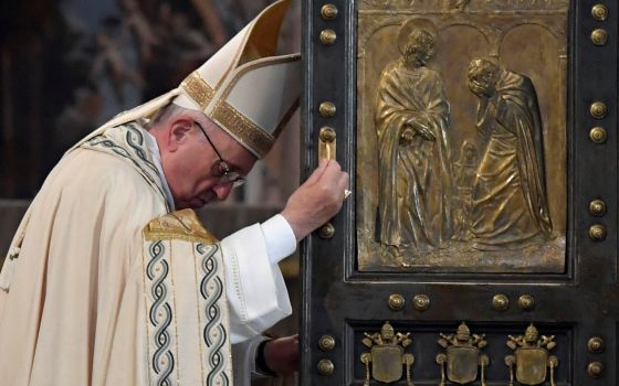 Pope Francis closes the Holy Door of St. Peter's Basilica to mark the closing of the jubilee Year of Mercy at the Vatican, Nov. 20, 2016. (CNS photo/Tiziana Fabi, pool via Reuters)