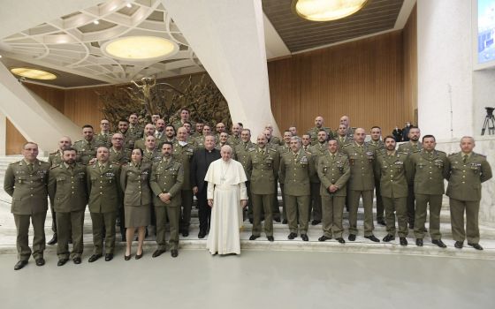 Pope Francis is pictured with members of the Italian Army during his general audience in the Paul VI hall at the Vatican March 2, 2022. (CNS photo/Vatican Media)