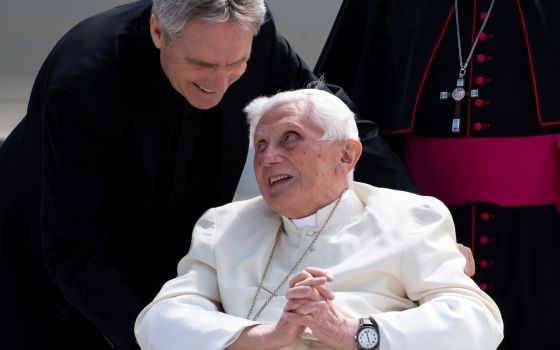 Retired Pope Benedict XVI speaks to his private secretary, Archbishop Georg Gänswein, at Germany's Munich Airport before his departure to Rome June 22, 2020. (CNS photo/Sven Hoppe, pool via Reuters)