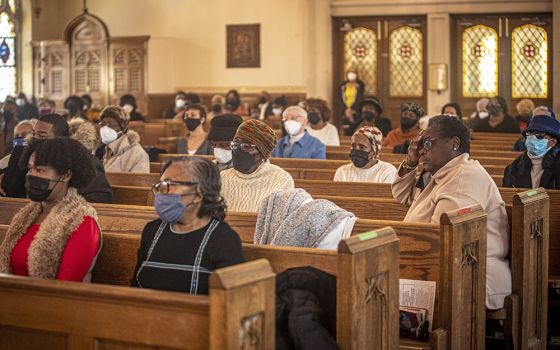 Parishioners attend Mass at St. Barbara Catholic Church Feb. 6 in Philadelphia. (CNS/Chaz Muth)
