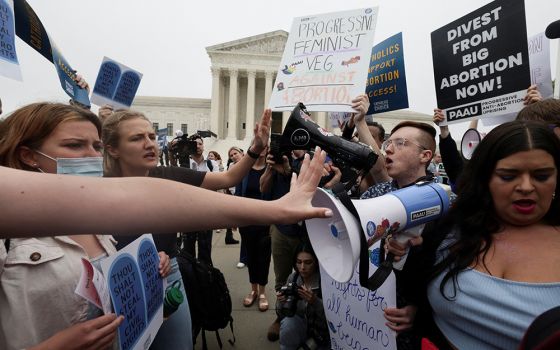 Abortion demonstrators in Washington are seen May 3 outside the U.S. Supreme Court, after the leak of a draft majority opinion written by Justice Samuel Alito preparing for a majority of the court to overturn Roe v. Wade. (CNS)