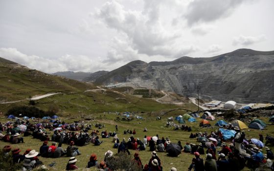 Members of Indigenous communities camp on the property of Chinese-owned Las Bambas copper mine in Peru April 26, 2022. (CNS/Reuters/Angela Ponce)