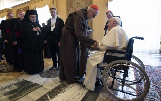 Pope Francis greets Cardinal Anders Arborelius of Stockholm, Sweden, during a meeting with members of the Pontifical Council for Promoting Christian Unity at the Vatican May 6, 2022. (CNS photo/Vatican Media)
