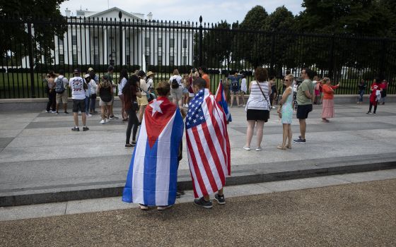 People gather near the White House in Washington July 25, 2021. (CNS photo/Tyler Orsburn)