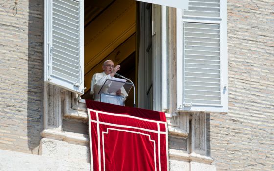 Pope Francis delivers his blessing as he leads the "Regina Coeli" from the window of his studio overlooking St. Peter's Square at the Vatican May 22, 2022. (CNS/Vatican Media)