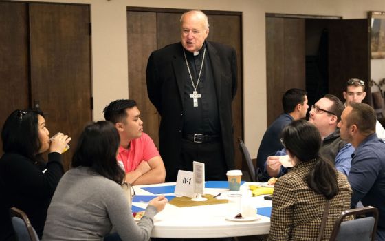 Bishop Robert McElroy of San Diego chats with participants in the closing session of the San Diego Diocese's synod on young adults at Mission San Diego de Alcalá Nov. 9, 2019. He was among 21 new cardinals named by Pope Francis May 29. (CNS)