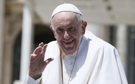Pope Francis waves as he leaves his general audience in St. Peter's Square at the Vatican June 8. (CNS/Paul Haring)