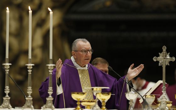 Cardinal Pietro Parolin, Vatican secretary of state, celebrates an evening Mass for peace in Ukraine in St. Peter's Basilica at the Vatican March 16. (CNS/Paul Haring)