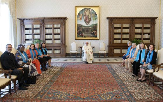 Pope Francis meets with a delegation from the World Union of Catholic Women's Organizations in the library of the Apostolic Palace June 11 at the Vatican. (CNS/Vatican Media)