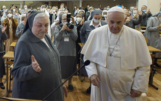 Sr. Yvonne Reungoat, then superior of the Salesian Sisters, is pictured with Pope Francis during a meeting with members of the order in Rome in this Oct. 22, 2021, file photo. (CNS/Vatican Media)