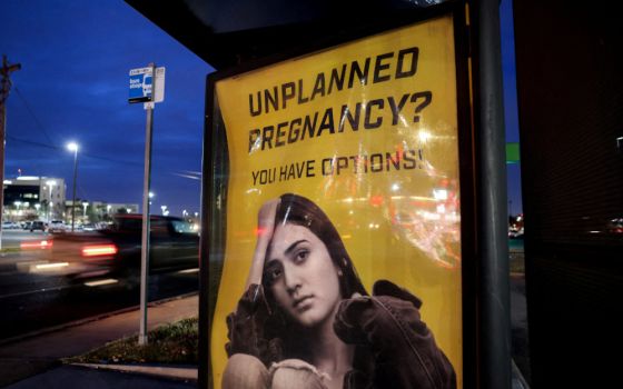 A billboard at a bus stop in Oklahoma City advertises adoption services for pregnant women Dec. 7, 2021. (CNS/Reuters/Evelyn Hockstein)