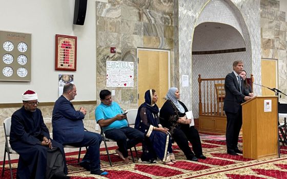 Mayor Tim Keller of Albuquerque, N.M., speaks at an interfaith memorial ceremony at the New Mexico Islamic Center Aug. 9, 2022. The ceremony was held to commemorate four murdered Muslim men came hours after police said they had arrested a prime suspect in