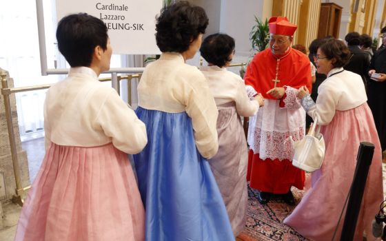 New South Korean Cardinal Lazarus You Heung-sik, prefect of the Dicastery for Clergy, greets guests at a reception after a consistory for the creation of 20 new cardinals at the Vatican Aug. 27 , 2022. (CNS photo/Paul Haring)