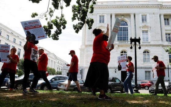 Union workers march for a new labor contract on Capitol Hill in Washington Aug. 2. (CNS/Reuters/Jonathan Ernst)