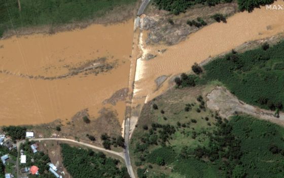 A satellite image shows a flooded bridge in the aftermath of Hurricane Fiona, in Arecibo, Puerto Rico, Sept. 21, 2022. (CNS photo/courtesy Maxar Technologies via Reuters)