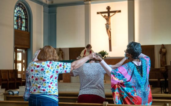 A handful of parishioners in the Gardenville neighborhood of Baltimore attend daily Mass Sept. 16, 2022, at St. Anthony of Padua Catholic Church.