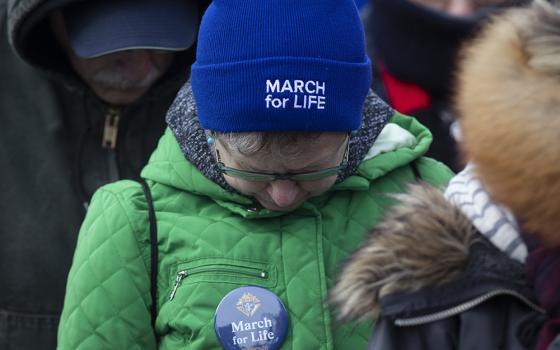 Pro-life advocates pray during the annual March for Life in Washington Jan. 21, 2022. (CNS/Tyler Orsburn)