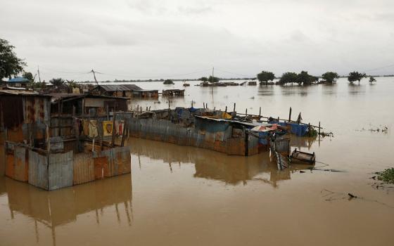 Houses are seen submerged in flood waters Oct. 13, 2022, in Lokoja, Nigeria. (CNS/Reuters/Afolabi Sotunde)