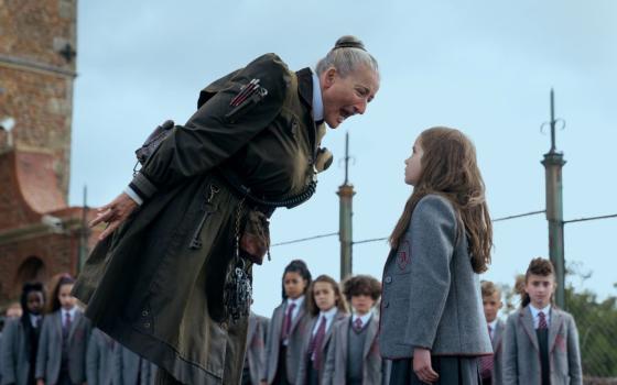 "Roald Dahl's Matilda the Musical" stars Emma Thompson as Agatha Trunchbull, a tyrannical principal, and Alisha Weir as student Matilda Wormwood. (Dan Smith/Netflix © 2022)