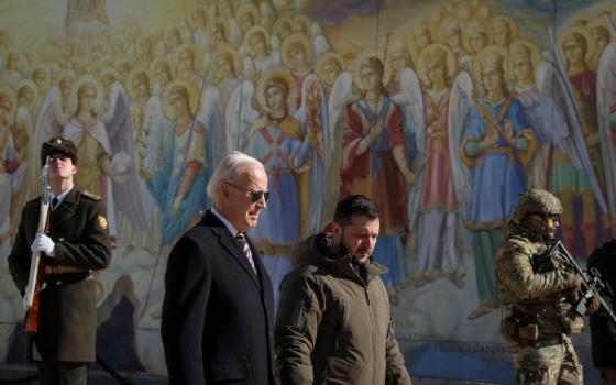 U.S. President Joe Biden and Ukrainian President Volodymyr Zelenskyy walk next to St. Michael's Orthodox Cathedral in Kyiv Feb. 20, 2023. Biden made an unannounced visit to Ukraine to meet with Zelenskyy, a gesture of solidarity that came days before the first anniversary of Russia's invasion of the country Feb. 24, 2022. (OSV News photo/Gleb Garanich, Reuters)
