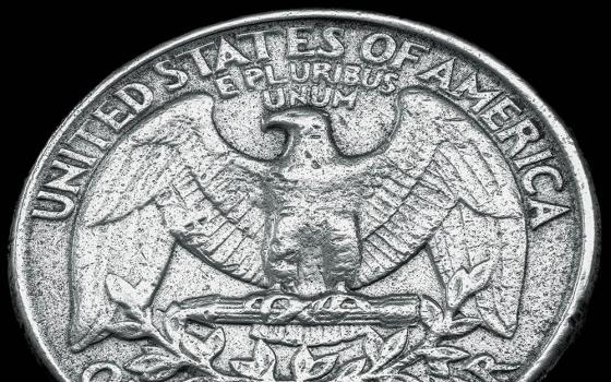 "E pluribus unum" on a U.S. quarter (Unsplash/Chris Briggs)