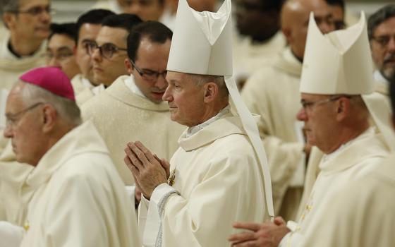 Bishop Thomas Paprocki of Springfield, Illinois, center, arrives in procession for Pope Francis' celebration of Mass marking the feast of Our Lady of Guadalupe in St. Peter's Basilica Dec. 12, 2019, at the Vatican. In attendance were U.S. bishops from Illinois, Indiana, and Wisconsin making their "ad limina" visits to the Vatican. (CNS/Paul Haring)