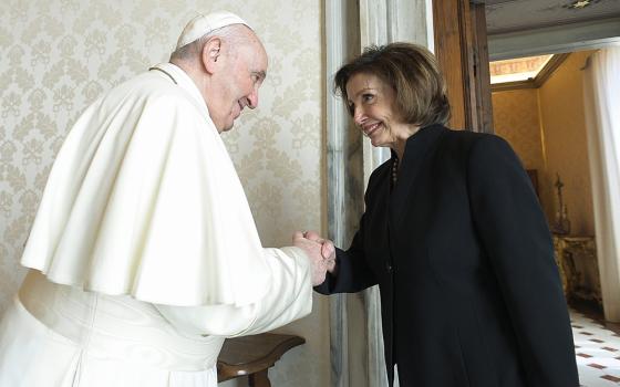 Pope Francis greets U.S. House Speaker Nancy Pelosi, D-Calif., during a private audience Oct. 9, 2021, at the Vatican. (CNS/Vatican Media)