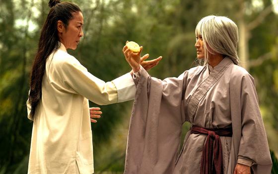 Michelle Yeoh, left, stars in a scene from the movie "Everything Everywhere All at Once." (OSV News/A24)