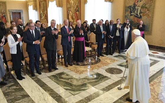 Pope Francis meets leaders from the tech industry March 27 at the Vatican. The pope called for an "ethical and responsible" development of artificial intelligence. (CNS/Vatican Media)