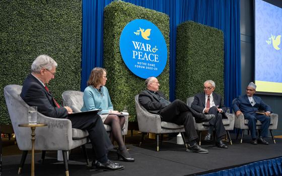 From left: Gerard Powers, Mary Ellen O'Connell, San Diego Cardinal Robert McElroy, Robert Latiff and Rashied Omar speak at the event titled "New and Old Wars, New and Old Challenges to Peace," as part of the Notre Dame Forum on March 1 at the University of Notre Dame in Indiana. (University of Notre Dame/Barbara Johnston)