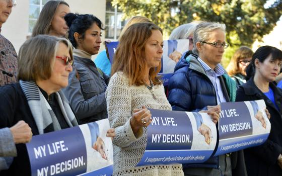 In an Oct. 26, 2015, file photo, right-to-die advocates rally outside the New Mexico Supreme Court in Santa Fe. (AP/Russell Contreras, File)