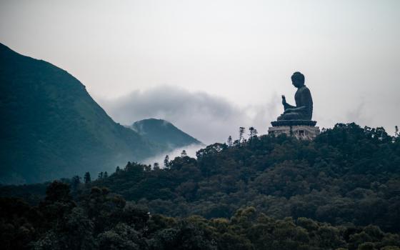 A statue of Buddha on a mountaintop (Jamie Street/Unsplash)