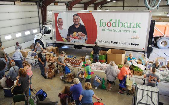 The walk-through setup of this mobile food pantry in Addison, New York, allows participants to select their own items, which aligns with the Food Bank of the Southern Tier's mission of encouraging personal choice in item selection. (Courtesy of Food Bank of the Southern Tier)