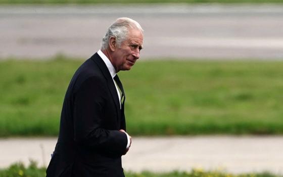 Britain's King Charles III walks at Aberdeen Airport in Scotland as he travels to London Sept. 9, 2022, following the Sept. 8 death of Queen Elizabeth II. (CNS photo/Aaron Chown, pool via Reuters)