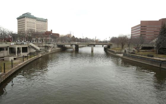 A file photo shows the Flint River in Michigan flowing thru downtown Flint. Advocates and agencies in Philadelphia, St. Louis, and Flint, spoke with OSV News about clean water issues that negatively affect their communities and children long after initial contamination. (OSV News/Reuters/Rebecca Cook)