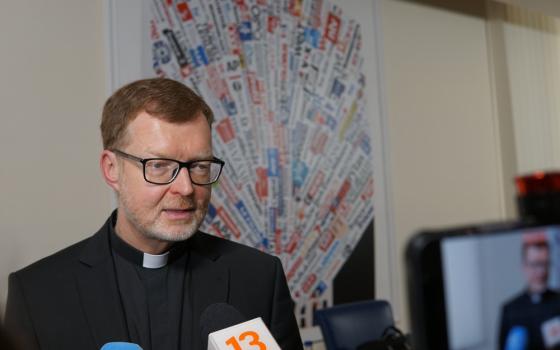Jesuit Father Hans Zollner speaks to reporters after a news conference at the headquarters of the Italian Foreign Press Association in Rome, Italy, April 17, 2023. (CNS photo/Justin McLellan)