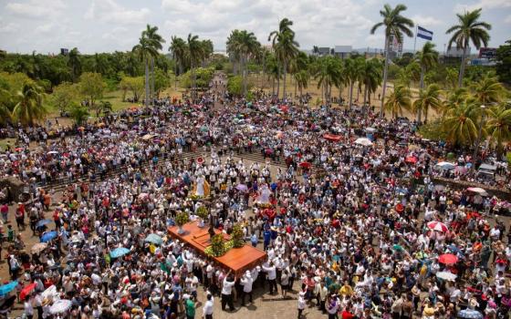 People gather for a Good Friday procession outside the Metropolitan Cathedral in Managua, Nicaragua April 7, as the government banned Holy Week street processions this year due to unspecified security concerns. (OSV News/Reuters)