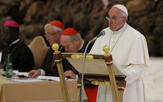 Pope Francis speaks at an event marking the 50th anniversary of the Synod of Bishops in Paul VI hall at the Vatican in this Oct. 17, 2015, file photo. The pope in his speech outlined his vision for how the entire church must be "synodal" with everyone listening to each other, learning from each other and taking responsibility for proclaiming the Gospel. (CNS/Paul Haring)
