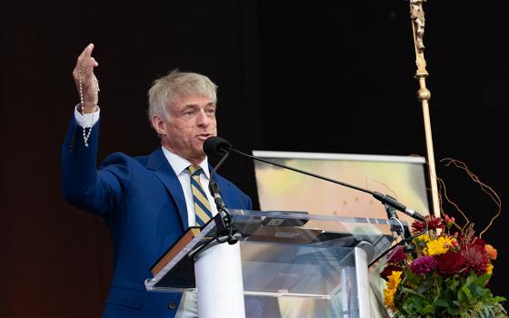 Michael Voris, founder of Church Militant, leads the praying of the rosary in Baltimore Nov. 16, 2021, during the organization's rally near the hotel where the U.S. Conference of Catholic Bishops was holding its fall general assembly Nov. 15-18. (CNS/Catholic Review/Kevin J. Parks)