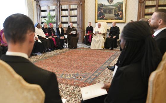 Cardinal Seán P. O'Malley of Boston, president of the Pontifical Commission for the Protection of Minors, speaks to Pope Francis during an audience with commission members at the Vatican May 5, 2023. The pope met with staff, members and leadership of the commission, which was holding its plenary assembly May 3-6 at the commission's new offices in Rome. (CNS photo/Vatican Media)