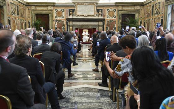 Pope Francis speaks to participants in the general assembly of Caritas Internationalis at the Vatican May 11, 2023. Caritas Internationalis is the umbrella organization for 162 official Catholic charities working in more than 200 countries. (CNS photo/Vatican Media)