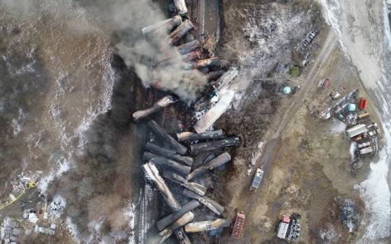 Drone footage taken Feb. 6, 2023, shows a freight train derailment in East Palestine, Ohio. Some 50 cars from the train derailed the evening of Feb. 3 near the Pennsylvania border. No injuries were reported following the crash, which sparked a massive fire that continued to burn Feb. 4. The derailed train was carrying toxic substances and three months later still face "a lot of uncertainty" about their surroundings. (OSV News photo/NTSBGov handout via Reuters)