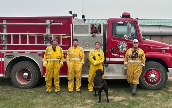 While Canada is fighting wildfires from western Alberta province to eastern Nova Scotia, Fr. Gerald Mendoza (third from left) is on the frontlines of the battle in firefighter uniform. (OSV News/Courtesy of Gerald Mendoza)