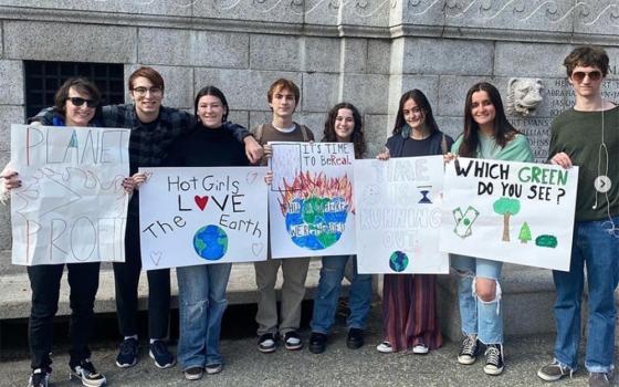 Photo from a #PeopleNotProfit protest, posted to the Climate Justice at Boston College Instagram account on March 26, 2022 (Courtesy of CJBC via @bcclimatejustice Instagram account)