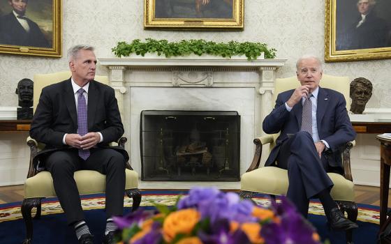 President Joe Biden meets with House Speaker Kevin McCarthy of California to discuss the debt limit in the Oval Office of the White House, May 22 in Washington. (AP photo/Alex Brandon)