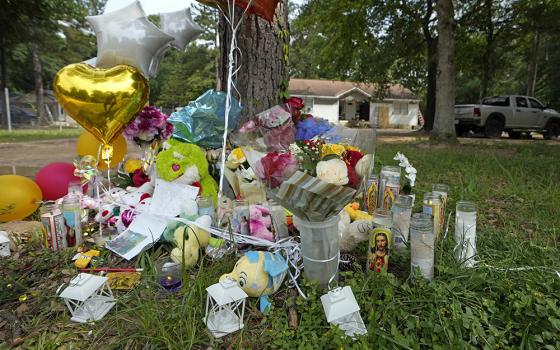 A makeshift memorial is shown Tuesday, May 2, outside the home where a mass shooting occurred Friday, April 28, in Cleveland, Texas. Authorities say a man shot five of his neighbors, including a child, after they asked him to stop firing off rounds in his yard. The suspect was arrested May 2 after a four-day manhunt. (AP photo/David J. Phillip)