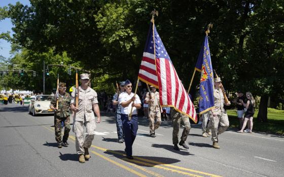 U.S. military veterans march in the annual Memorial Day parade in Setauket, New York, May 30, 2022. (CNS/Gregory A. Shemitz)