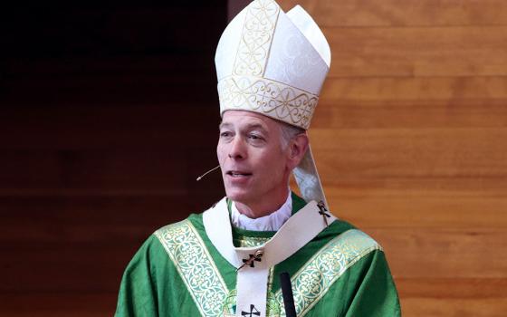 Archbishop Alexander Sample of Portland, Oregon, celebrates an August 2020 Mass at St. Mary Our Lady of Perpetual Help Parish in Albany, Oregon. (CNS/Catholic Sentinel/Ed Langlois)